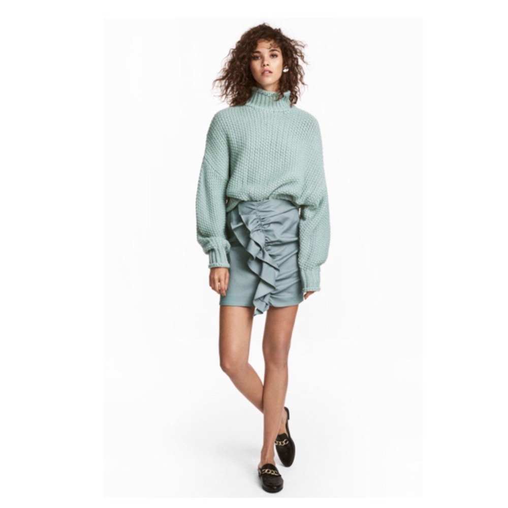 H&M LIGHT TURQUOISE FLOUNCED SKIRT
SIZE US 12